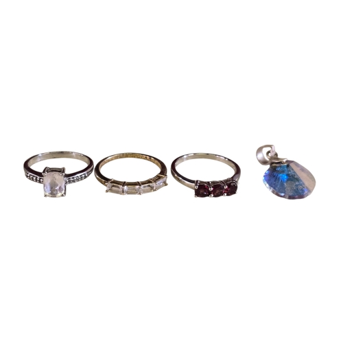19 - A collection of 925 silver gem-set rings,comprising a green peridot crossover ring with small accent... 