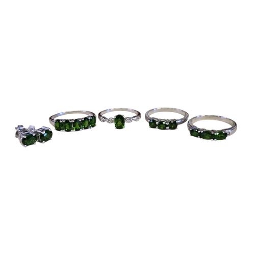 21 - A collection of sterling silver and chrome diopside jewellery, comprising a five-stone ring, size T½... 
