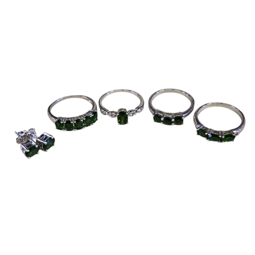 21 - A collection of sterling silver and chrome diopside jewellery, comprising a five-stone ring, size T½... 