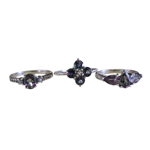 23 - A collection of 925 silver and mystic topaz jewellery,comprising an oval-cut mystic topaz solitaire ... 