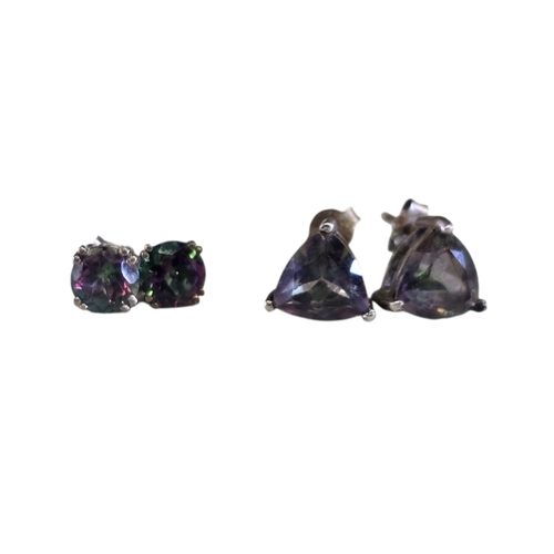 23 - A collection of 925 silver and mystic topaz jewellery,comprising an oval-cut mystic topaz solitaire ... 