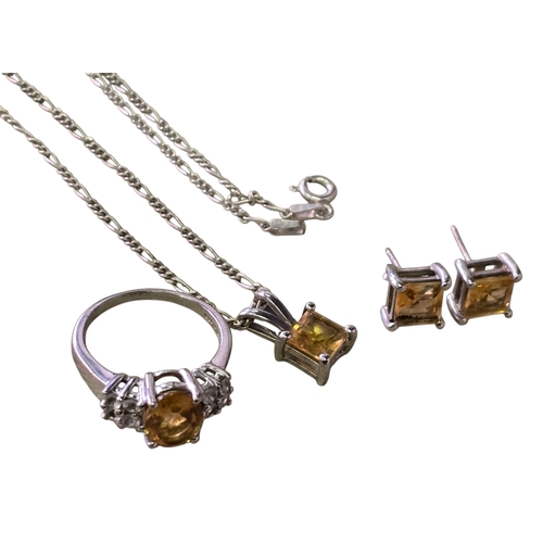28 - A collection of 925 silver and citrine jewellery, comprising a citrine and white stone three-stone r... 