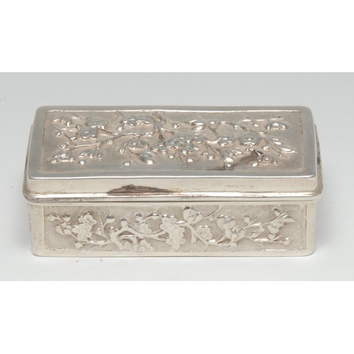 1002 - A Chinese silver rectangular snuff box, chased with blossoming prunus, 8cm wide, Wang Hing & Co, Hon... 