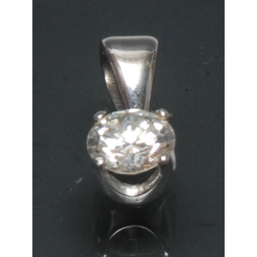 1116 - A fine solitaire diamond pendant, round modern brilliant cut diamond, approx 7.05mm x 4.10mm, calcul... 