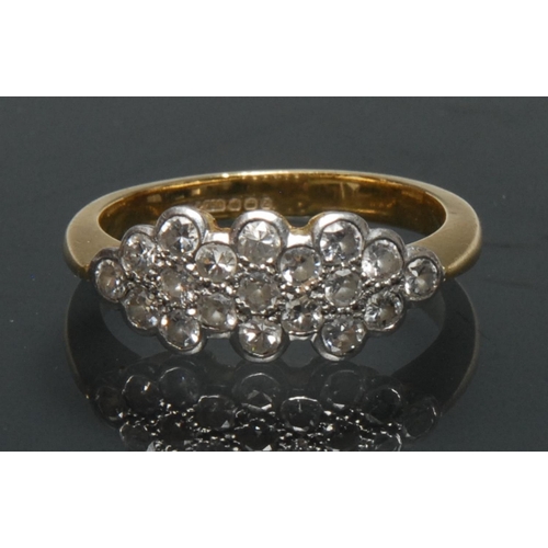 1138 - A diamond cluster ring, shaped crest inset with nineteen round brilliant cut diamonds, platinum cres... 