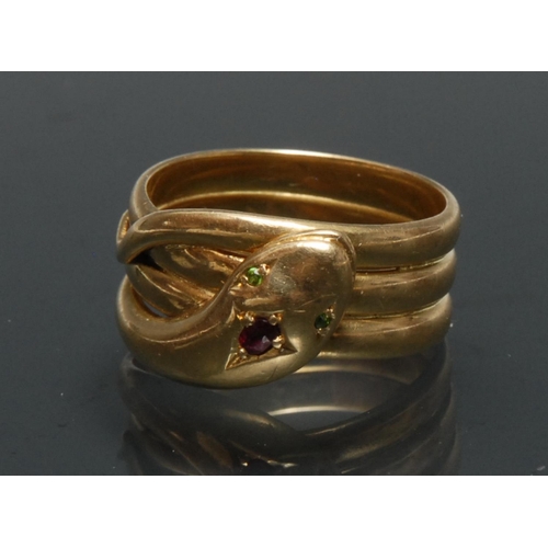 1147 - A Gentleman's Snake signet ring coiled triple loop shank, crossed head and tail, peridot eyes, deep ... 