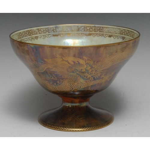 125A - A Wedgwood Dragon and Butterfly lustre ogee-shaped pedestal bowl,  designed by Daisy Makeig-Jones, t... 