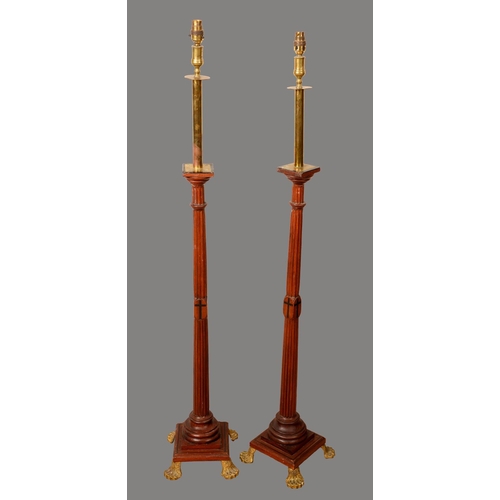 1938 - Ecclesiastical Salvage - a pair of oak floor standing lamps, each as a fluted architectural column, ... 