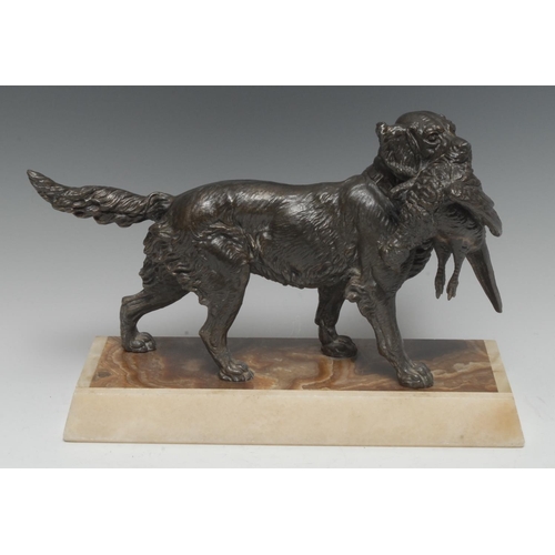 1945 - French School (early 20th century), a bronzed metal animalier study, of a gun dog retrieving game, r... 