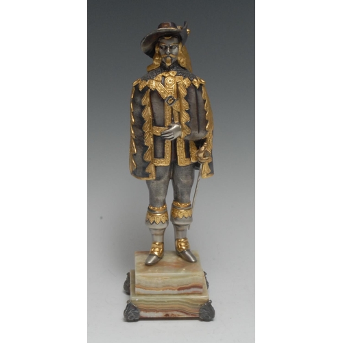 1949 - Giuseppe Vasari (Italian 20th century), a silvered and parcel-gilt bronze, of a cavalier, he stands,... 