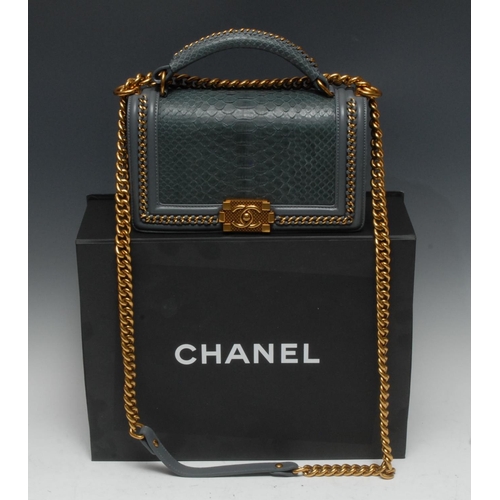 1959 - Luxury Fashion - a Chanel handbag, turquoise leather with snakeskin textured cover and handle, gilt ... 