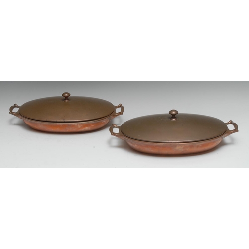 1980 - William Arthur Smith Benson (1854 - 1924) - a pair of Arts and Crafts copper oval entree dishes, dom... 