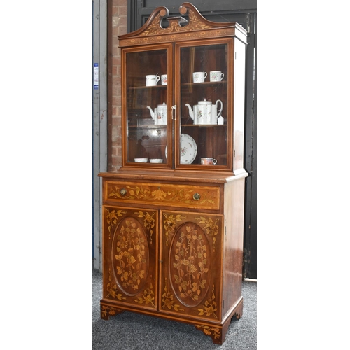 2002 - A small Sheraton Revival satinwood crossbanded mahogany and marquetry bookcase, swan neck pediment a... 