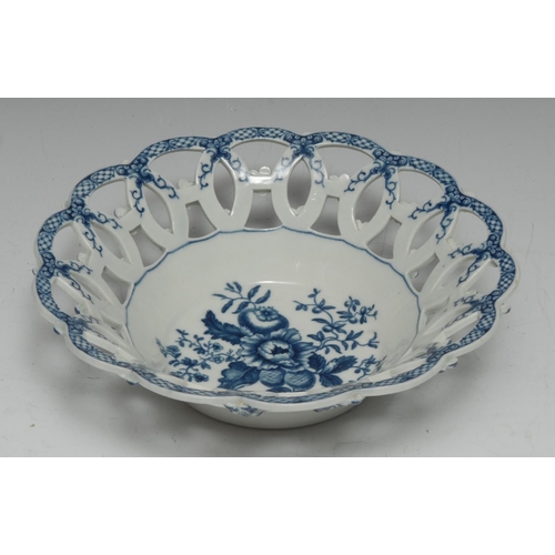 81 - A Worcester Pine Cone pattern shaped circular basket, printed in underglaze blue with peony between ... 