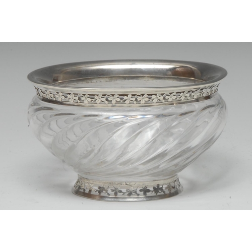 984 - A French silver mounted clear glass wrythen oval sweetmeat bowl, flared rim and spreading foot pierc... 