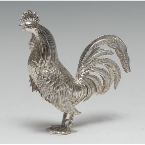 993 - A Continental silver coloured metal novelty model, of a cockerel, probably Spanish, 11.5cm high