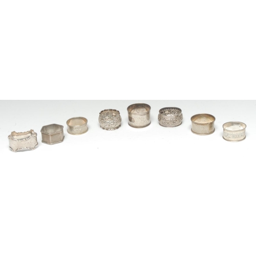 995 - A collection of silver napkin rings, various dates and makers (8)