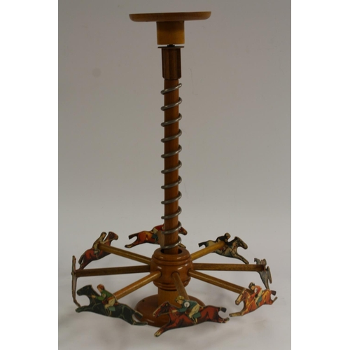 3024 - An early 20th century French parlour toy, the Grand Prix Merry Go Round Race Game, 42.5cm high, c.19... 