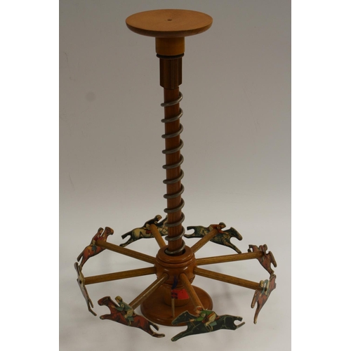 3024 - An early 20th century French parlour toy, the Grand Prix Merry Go Round Race Game, 42.5cm high, c.19... 