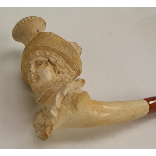 3061 - A 19th century meerschaum pipe, the bowl carved as a lady of fashion, 10.5cm long, c.1890, cased