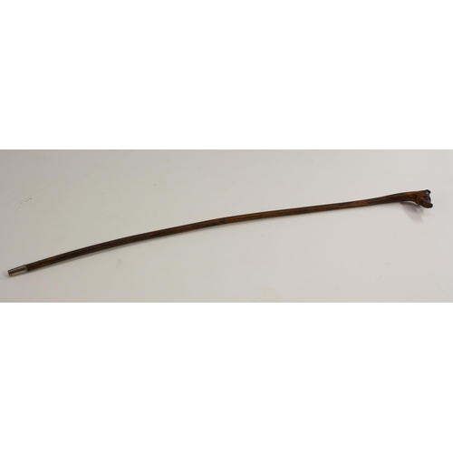 3066 - A 19th century novelty riding crop or child's walking cane, the pommel carved as the head of a dog, ... 