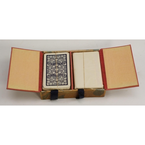 3073 - A 19th century rectangular playing card box, hinged twin covers transfer printed with caricature fig... 