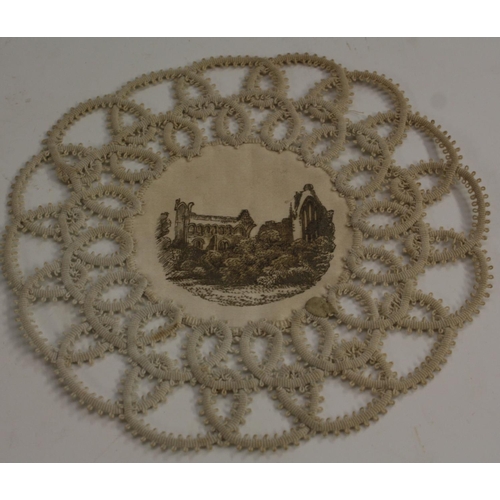 3245 - A set of twelve 19th century silk and crochet roundels, each painted engrisaille with a topographica... 