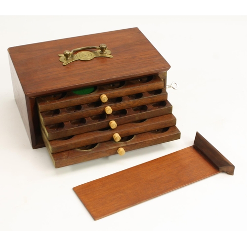 3306 - An early 20th century numismatist's portable coin cabinet, the lockable sliding front enclosing five... 