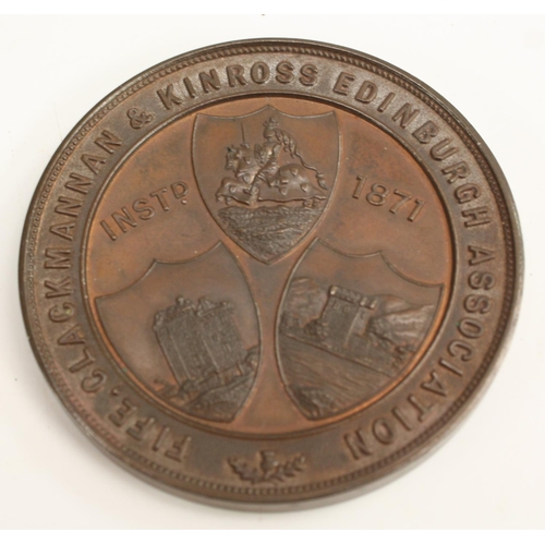 3310 - An early 20th century Scottish silver coloured metal medallion, Alloa Academy, the obverse struck wi... 