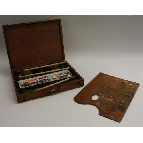 3321 - An Edwardian mahogany rectangular travelling artist's box, hinged cover enclosing a palette and an a... 