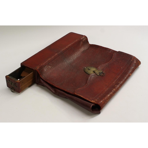 3341 - An unusual George III morocco leather dispatch case, hinged cover enclosing a marbled paper-lined in... 