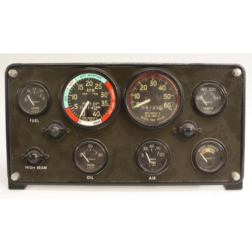 3348 - Automobilia - an American dashboard instrument panel,  gages for fuel, speed, revolutions per minute... 