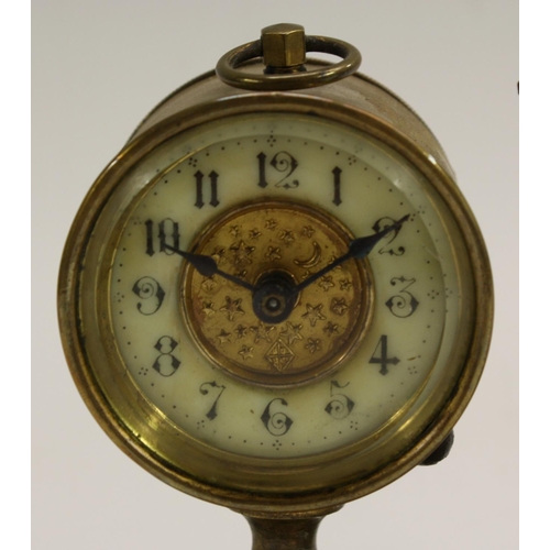 3370 - Football - a late Victorian brass novelty timepiece, as a footballer standing before an open goal, t... 