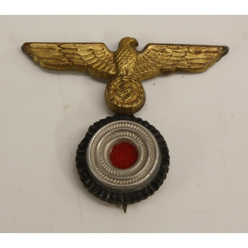 3503 - Nazism - a collection of Nazi German Third Reich badges and insignia, including an enamel NSDAP part... 