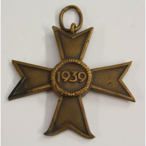 3503 - Nazism - a collection of Nazi German Third Reich badges and insignia, including an enamel NSDAP part... 