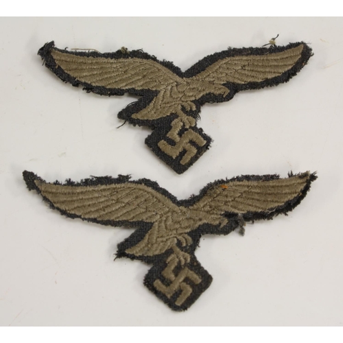 3503 - Nazism - a collection of Nazi German Third Reich badges and insignia, including an enamel NSDAP part... 