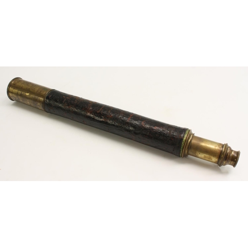 3565 - A 19th century brass telescope, with single draw and sliding shade, aperture covers to eyepiece and ... 