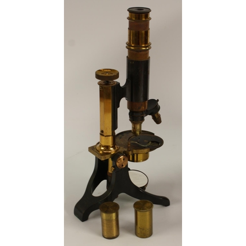 3567 - A 19th century lacquered and patinated brass monocular microscope, by E Saunders, High Street, Oxfor... 