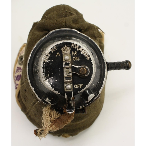 3615 - An Air Ministry issue brown leather flying helmet, chamois lined, integral bakelite earphones marked... 