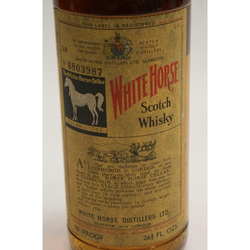 3632 - White Horse Scotch Whisky, c. 1970, 70°, 26 2/3 Fl. Oz., Numbered 6803987, label good, seal intact, ... 