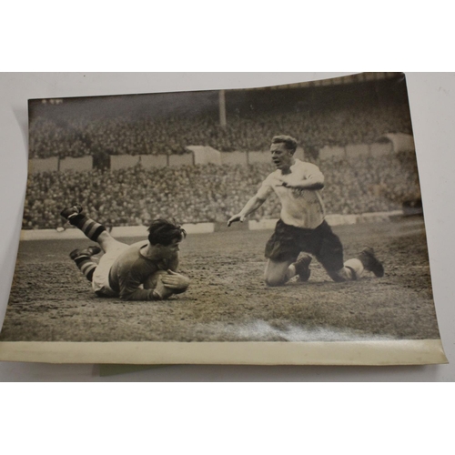 3460 - Football interest - a quantity of press photographs, 1957 season football action shots to include St... 