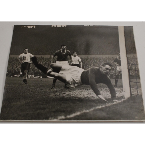 3460 - Football interest - a quantity of press photographs, 1957 season football action shots to include St... 