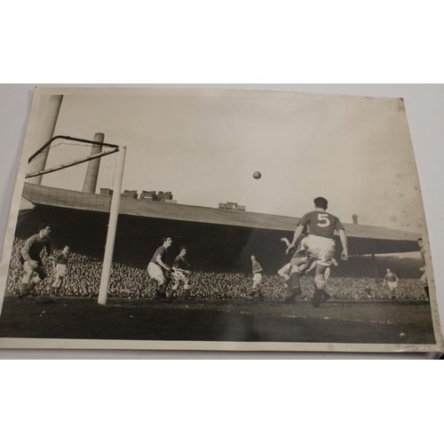 3460 - Football interest - a quantity of press photographs, 1957 season football action shots to include St... 