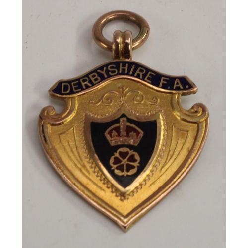 3461 - Football interest - an enamelled  9ct gold Derbyshire Football Association medal 1926-27, cased