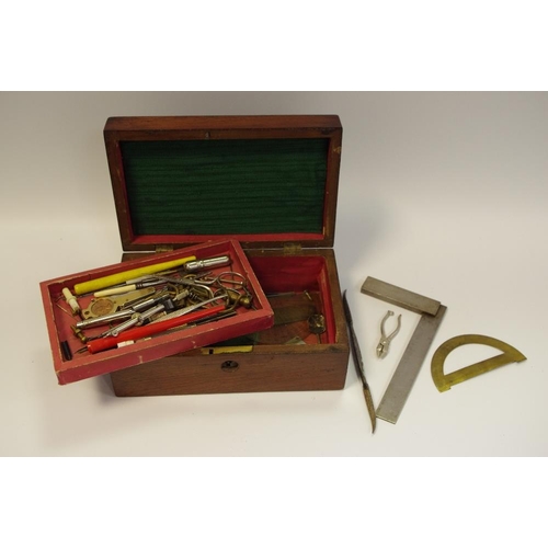 307 - A Victorian walnut work box c.1860 holding various drawing instruments