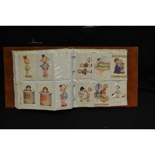 355 - Postcards - Mabel Lucie Attwell - a comprehensive album of original examples including 124 examples;... 