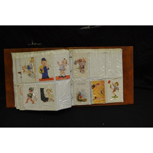 355 - Postcards - Mabel Lucie Attwell - a comprehensive album of original examples including 124 examples;... 