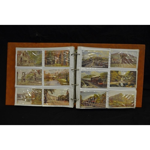 363 - Postcards - an album holding mainly early 20th century coloured railway related examples including L... 