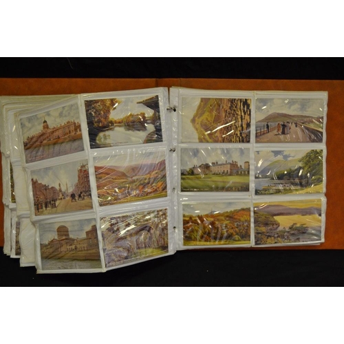 363 - Postcards - an album holding mainly early 20th century coloured railway related examples including L... 