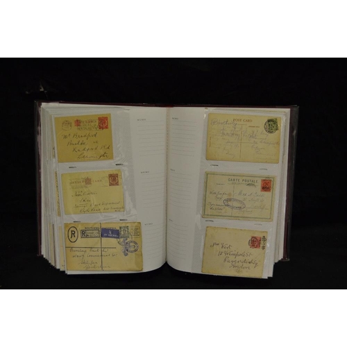 375 - Postal History - an interesting album of mainly Edwardian postcards and post marks on envelopes incl... 